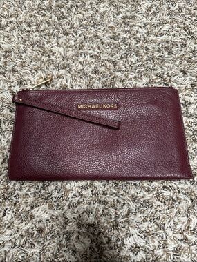 Michael Kors Burgundy Pebbled Leather Wristlet with Gold Logo